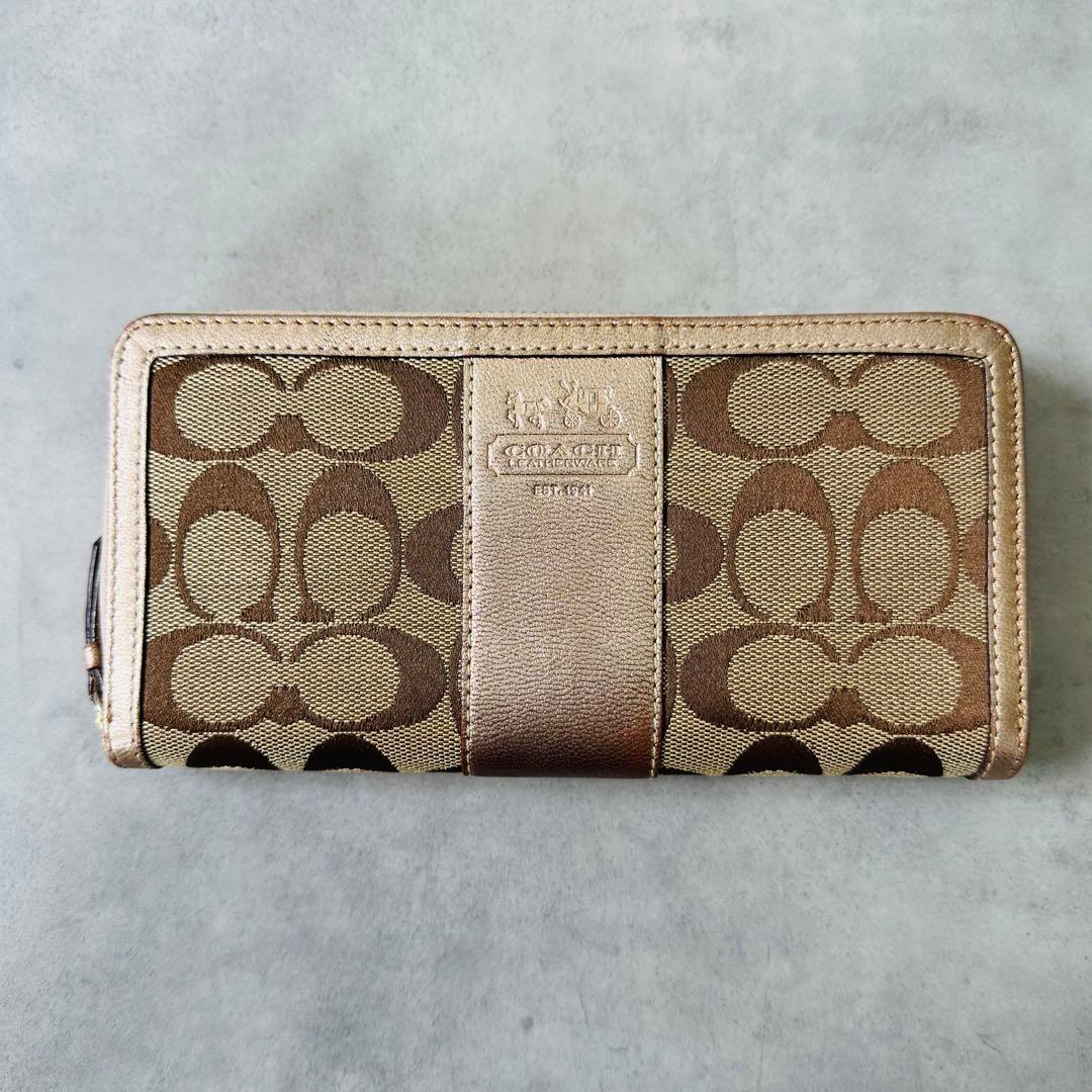 COACH シグネチャー ホースキャリッジ　ラウンドジップ長財布