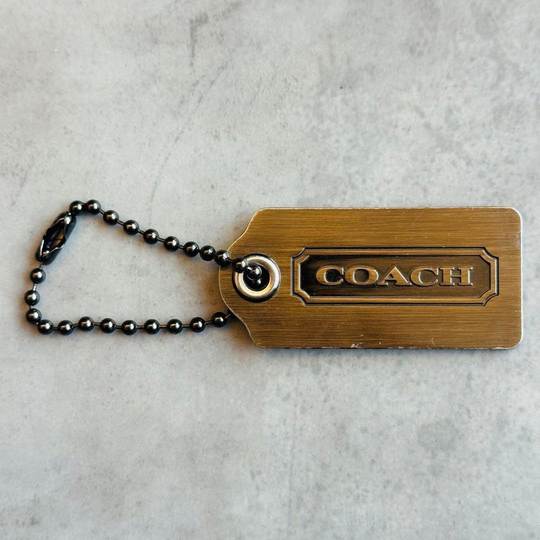 OLD COACH Bronze metal hangtag charm