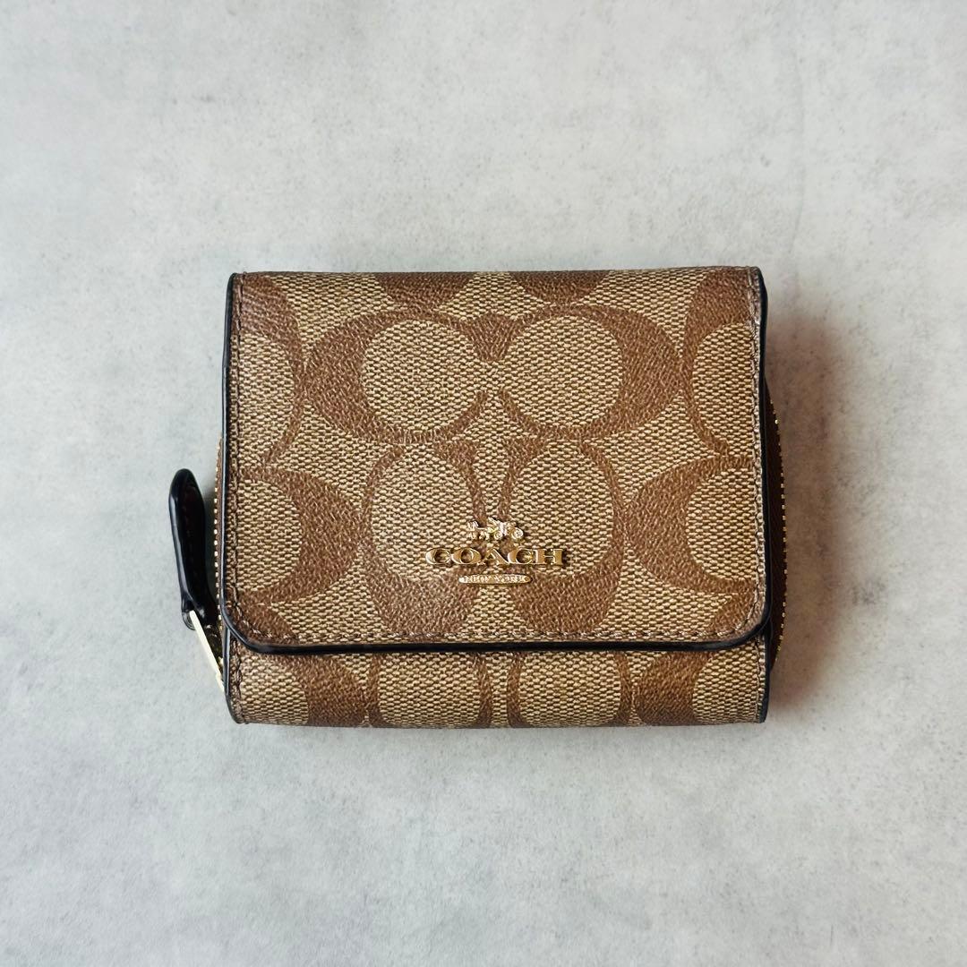 COACH ミニ トライフォールド ウォレット・シグネチャー キャンバス　①