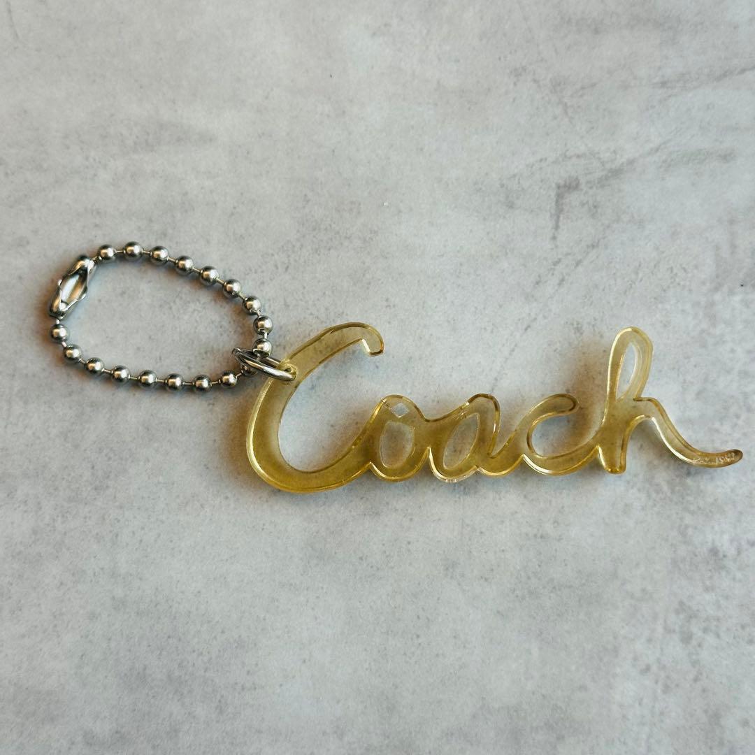 COACH POPPY hangtag charm Cursive logo