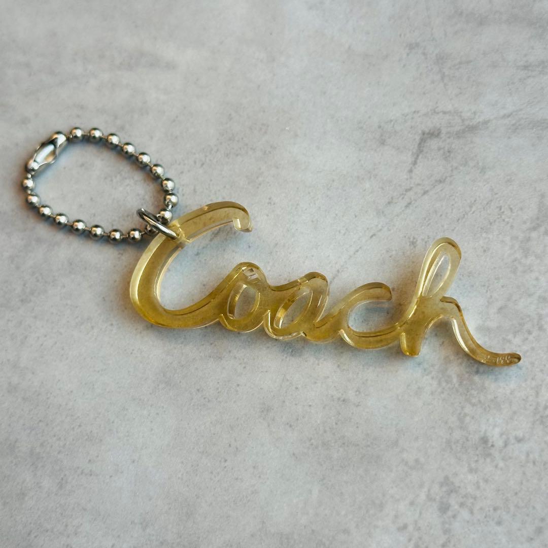 COACH POPPY hangtag charm Cursive logo 2