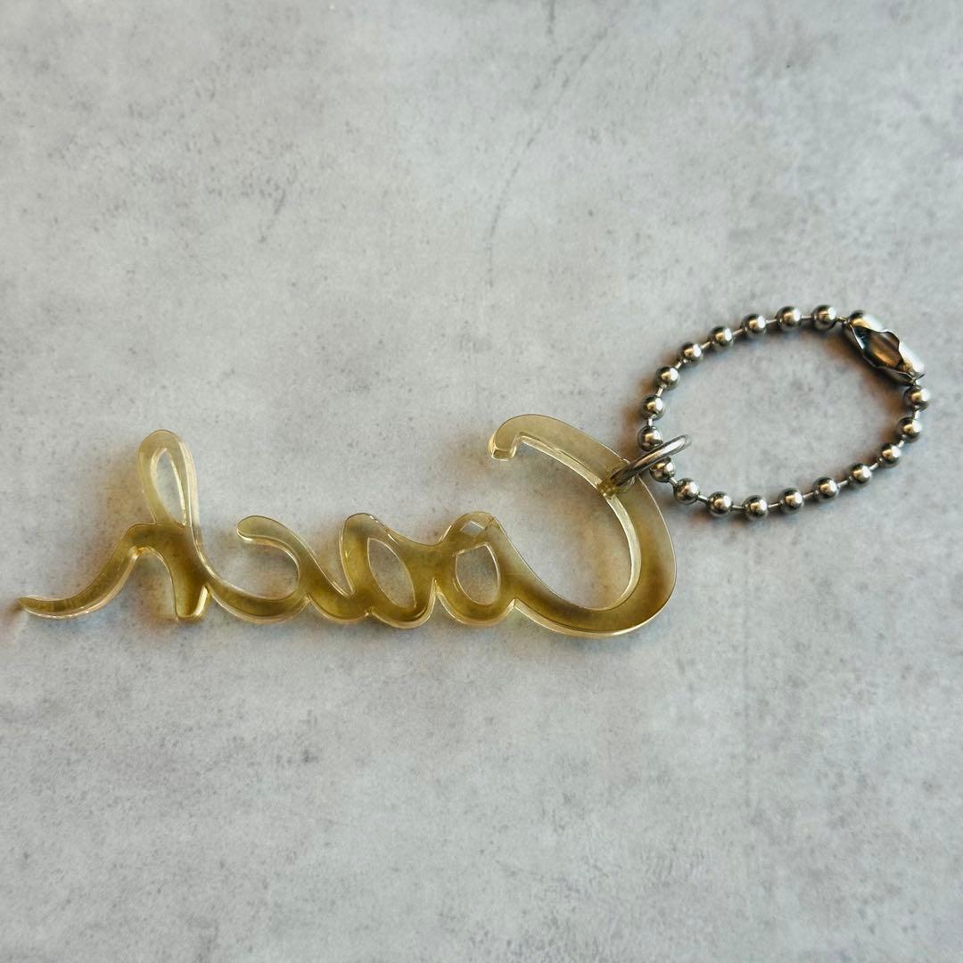 COACH POPPY hangtag charm Cursive logo 3