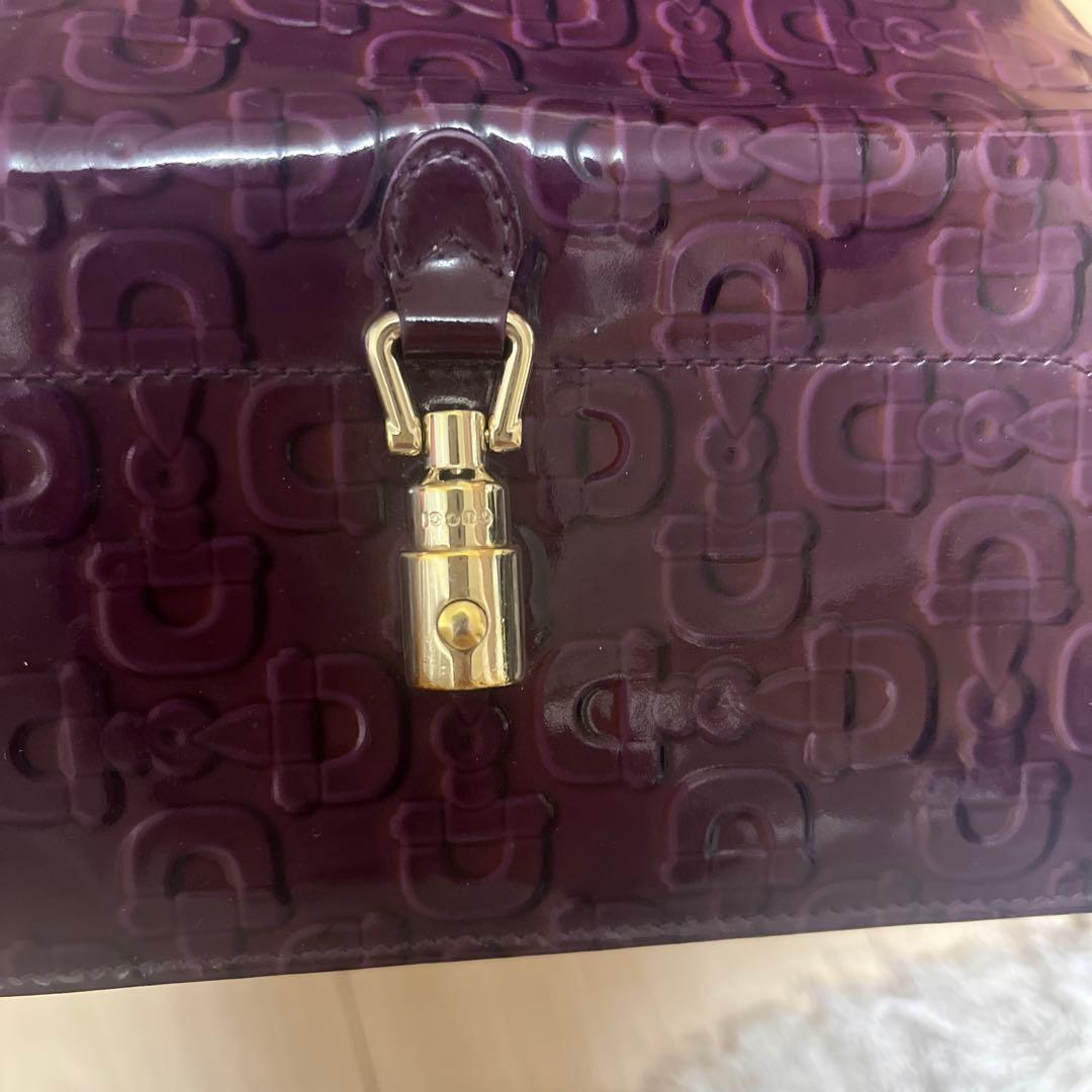 Gucciダークパープル エンボスロゴ 長財布 13