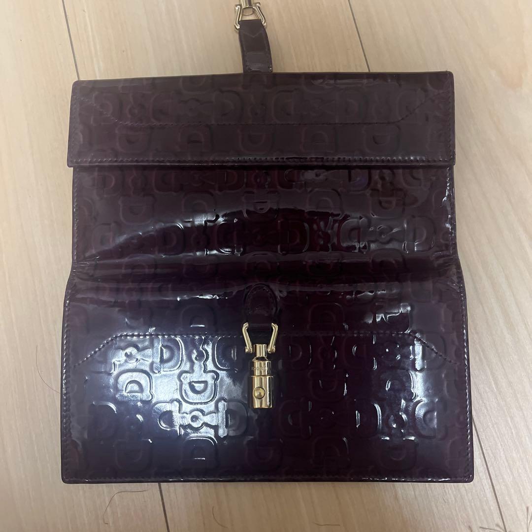Gucciダークパープル エンボスロゴ 長財布 10