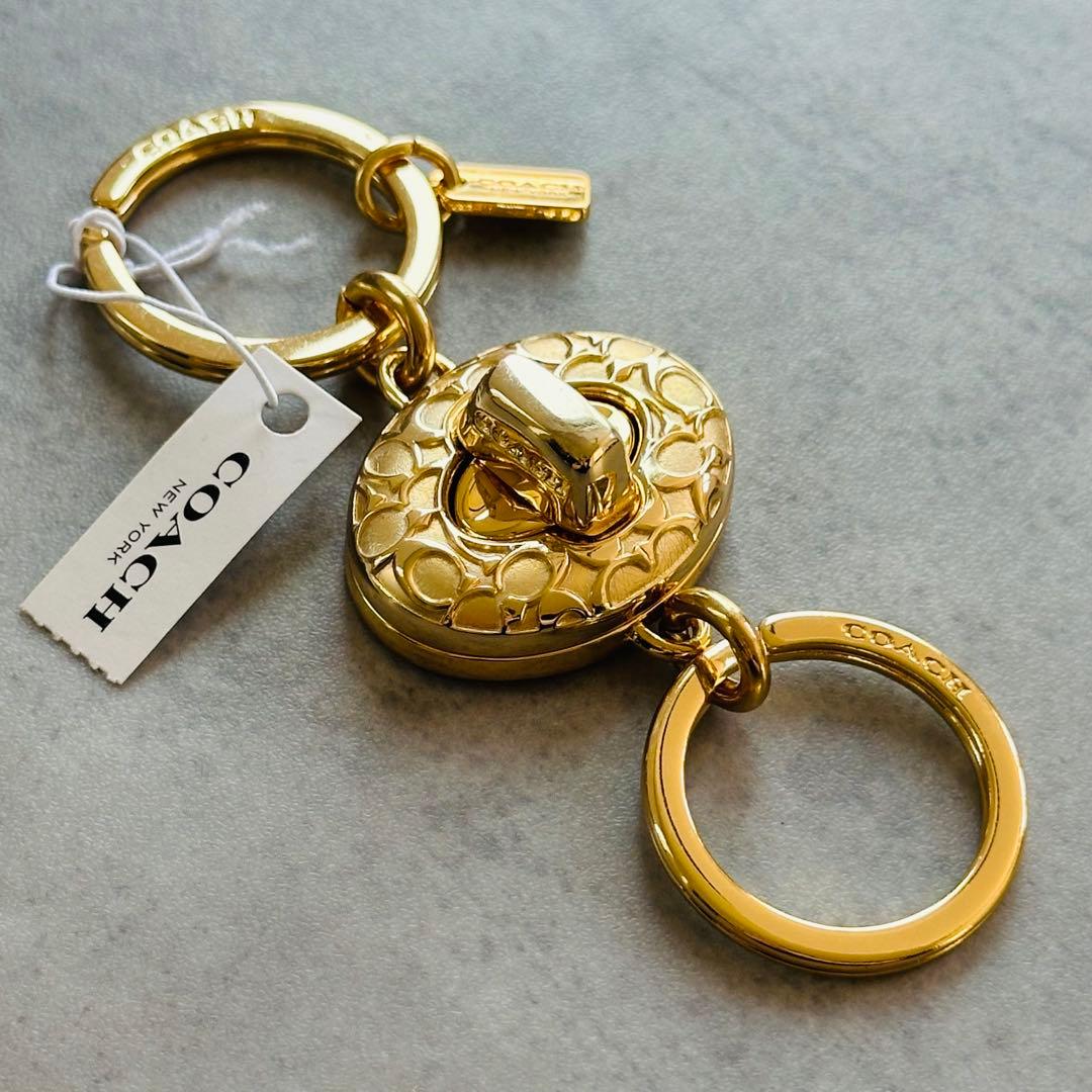 COACH Embossed Signature Turn Lock Charm 2