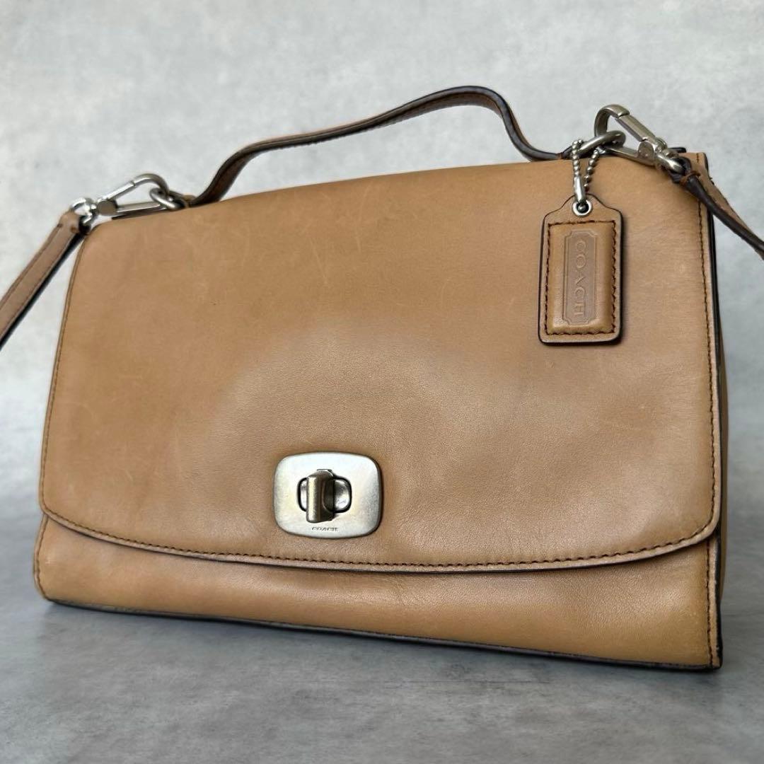 COACH Lacgacy Turn lock Saddle 2way Bag